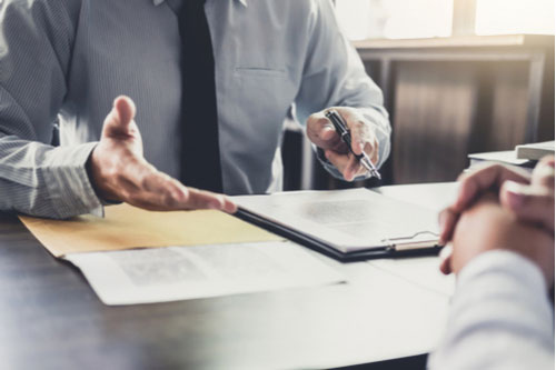 Lawyer and client discuss personal injury statute of limitations