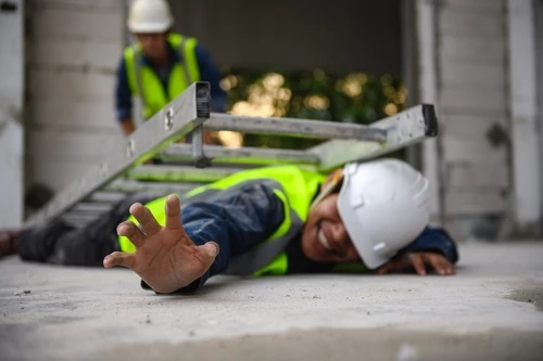 A man is hurt by a ladder in a construction accident and needs a workers' compensation lawyer.