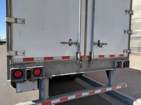Underride guard on a commercial truck trailer